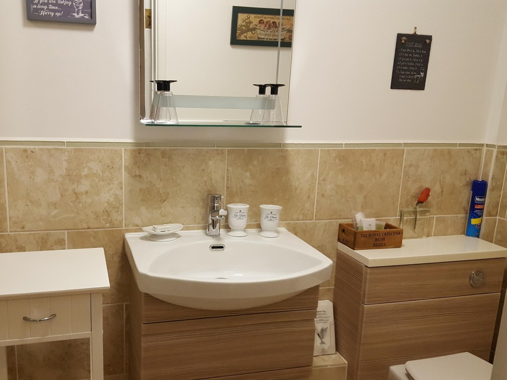 An en-suite bathroom at White Guest House